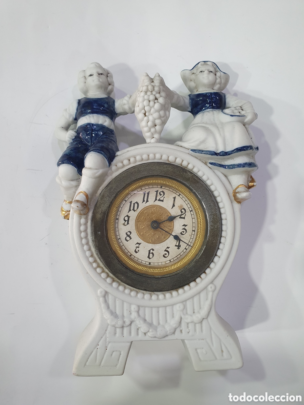 Antig&uuml;edades: Antiguo reloj en biscuit. (L98) - Foto 1