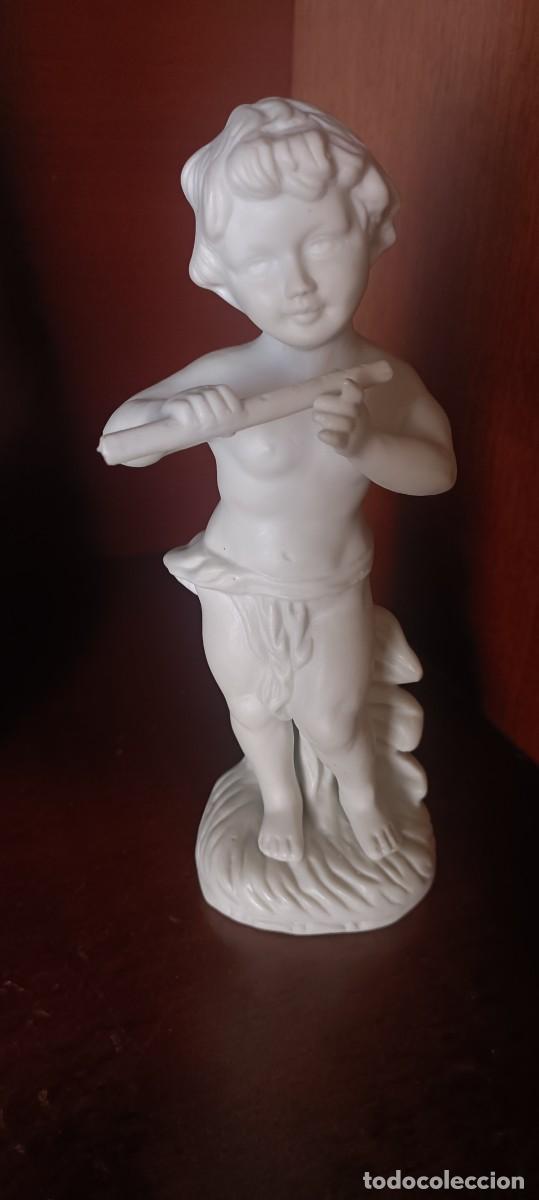 Antiques: Querub&iacute;n m&uacute;sico flauta biscuit