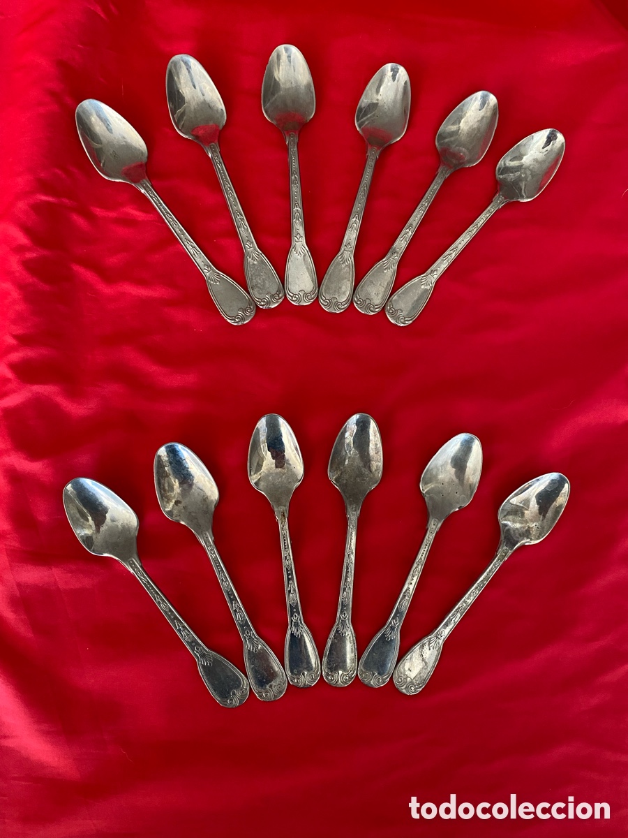 Antig&uuml;edades: Juego de 12 antiguas cucharas de moka (caf&eacute;). Plata (no ba&ntilde;o) contraste 800. Flor de lis.