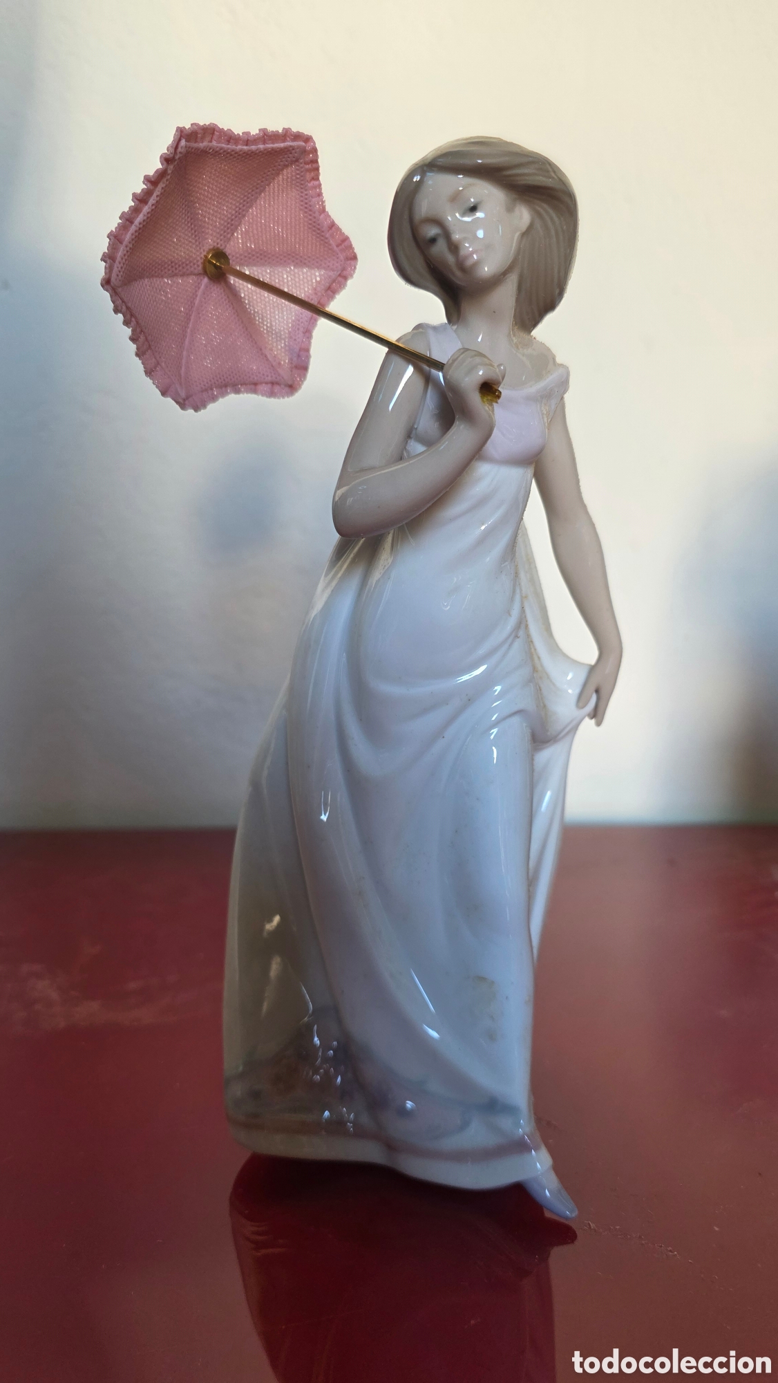 Antig&uuml;edades: Figura porcelana lladro bajo el sol de primavera