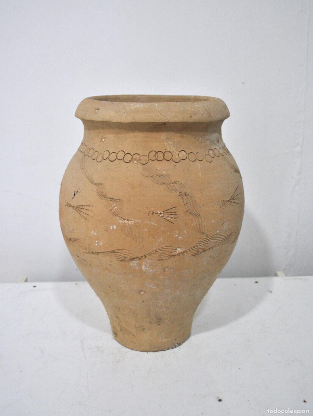 Antig&uuml;edades: Vasija antigua de barro cocido