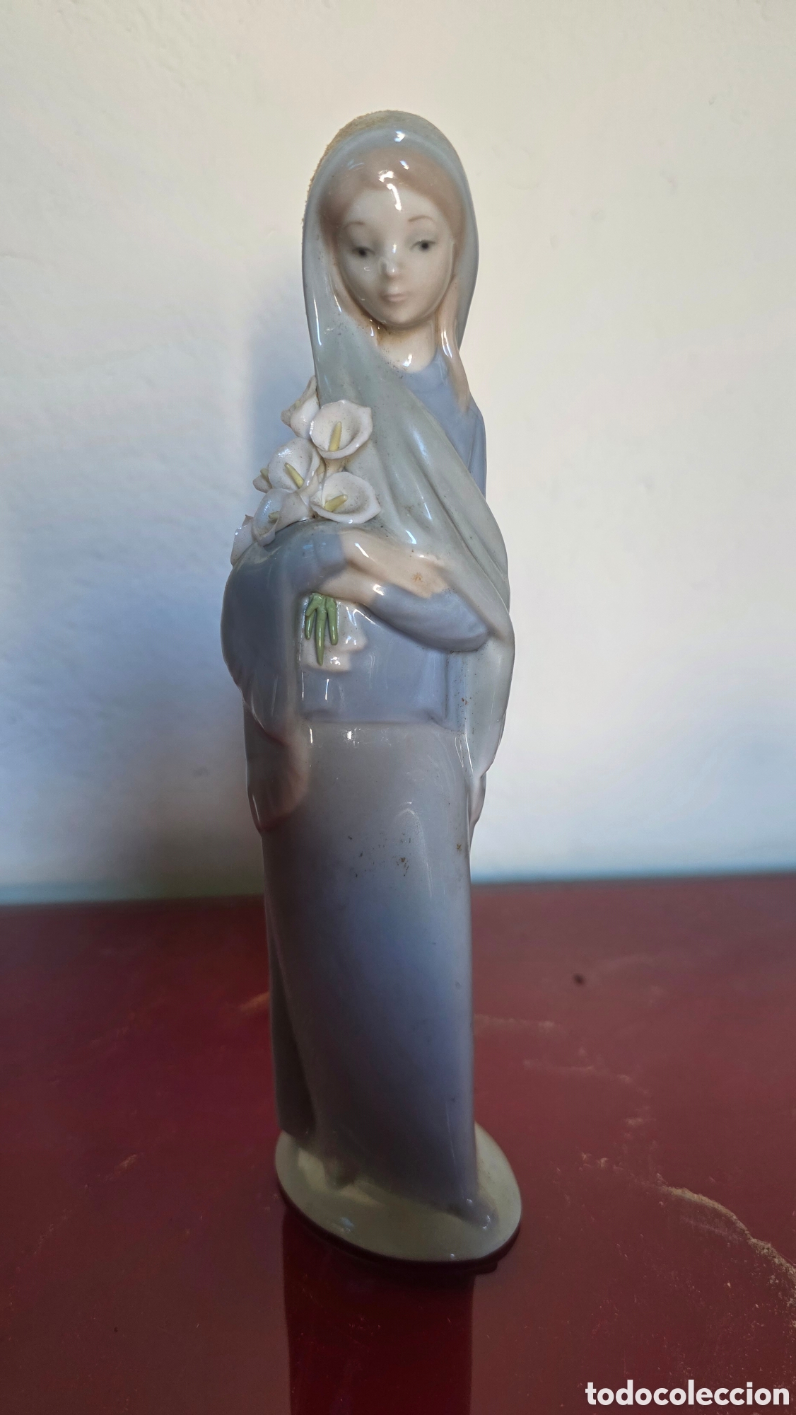 Antig&uuml;edades: Figura porcelana lladro ni&ntilde;a con dalias