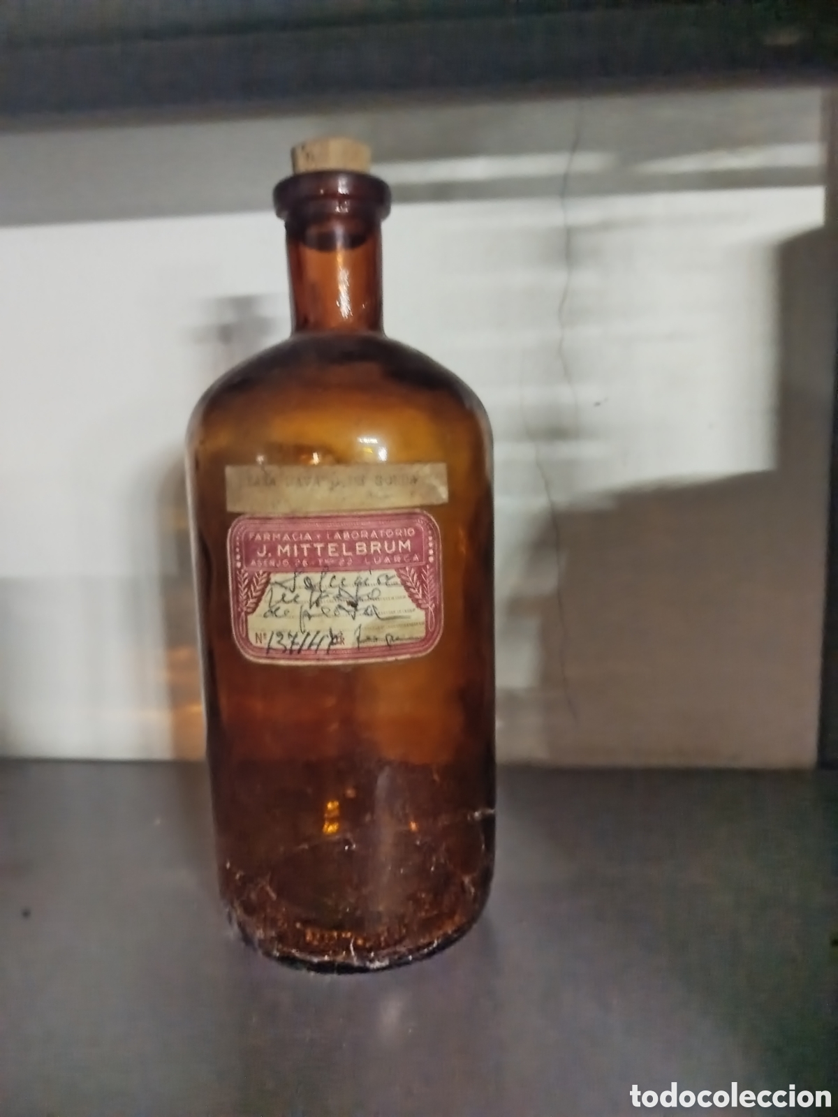 Antig&uuml;edades: Botella de farmacia J.MITTELBRUN