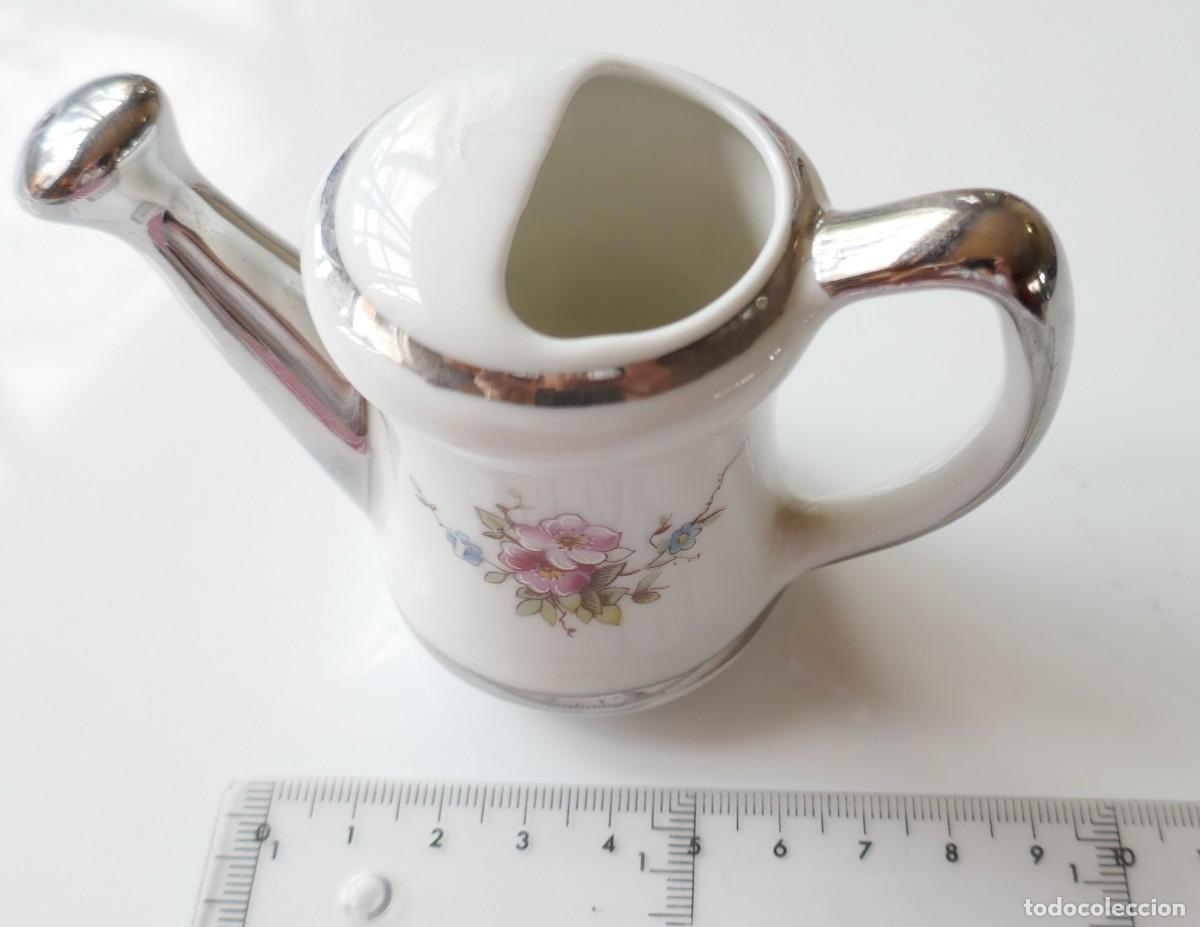 Antig&uuml;edades: REGADERA PORCELANA *ENGA*. MEDIDAS: 4 CM DI&Aacute;METRO X 7 CM ALTURA