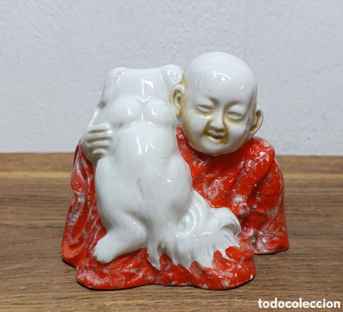 Antig&uuml;edades: ANTIGUA Y ESCASA FIGURA DE BUDA CON PERRO FOO DE PORCELANA CH HISPANIA.