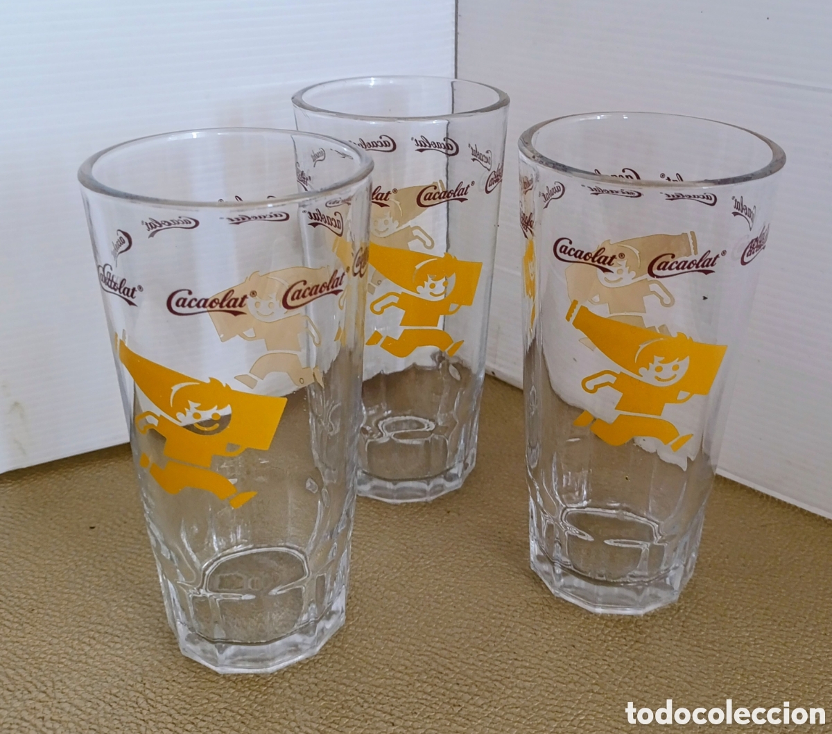 Antig&uuml;edades: Lote de 3 vasos Largos de Cola cao - Foto 1