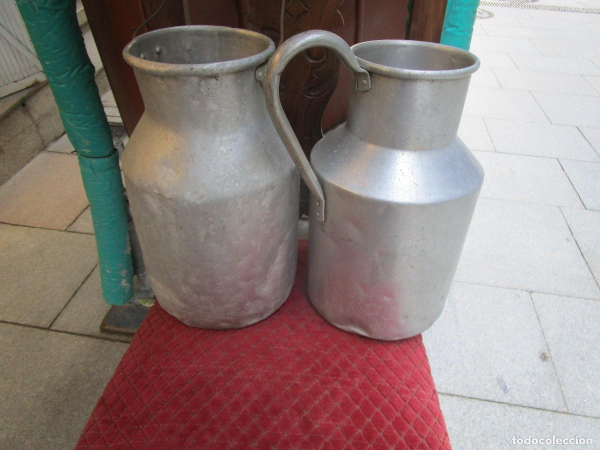Antig&uuml;edades: * 2 LECHERAS ALUMINIO - 8 Y 10 LITROS CARECEN DE TAPA. LAVADAS. UNA 4 TALADROS EN LA BASE. + INFO