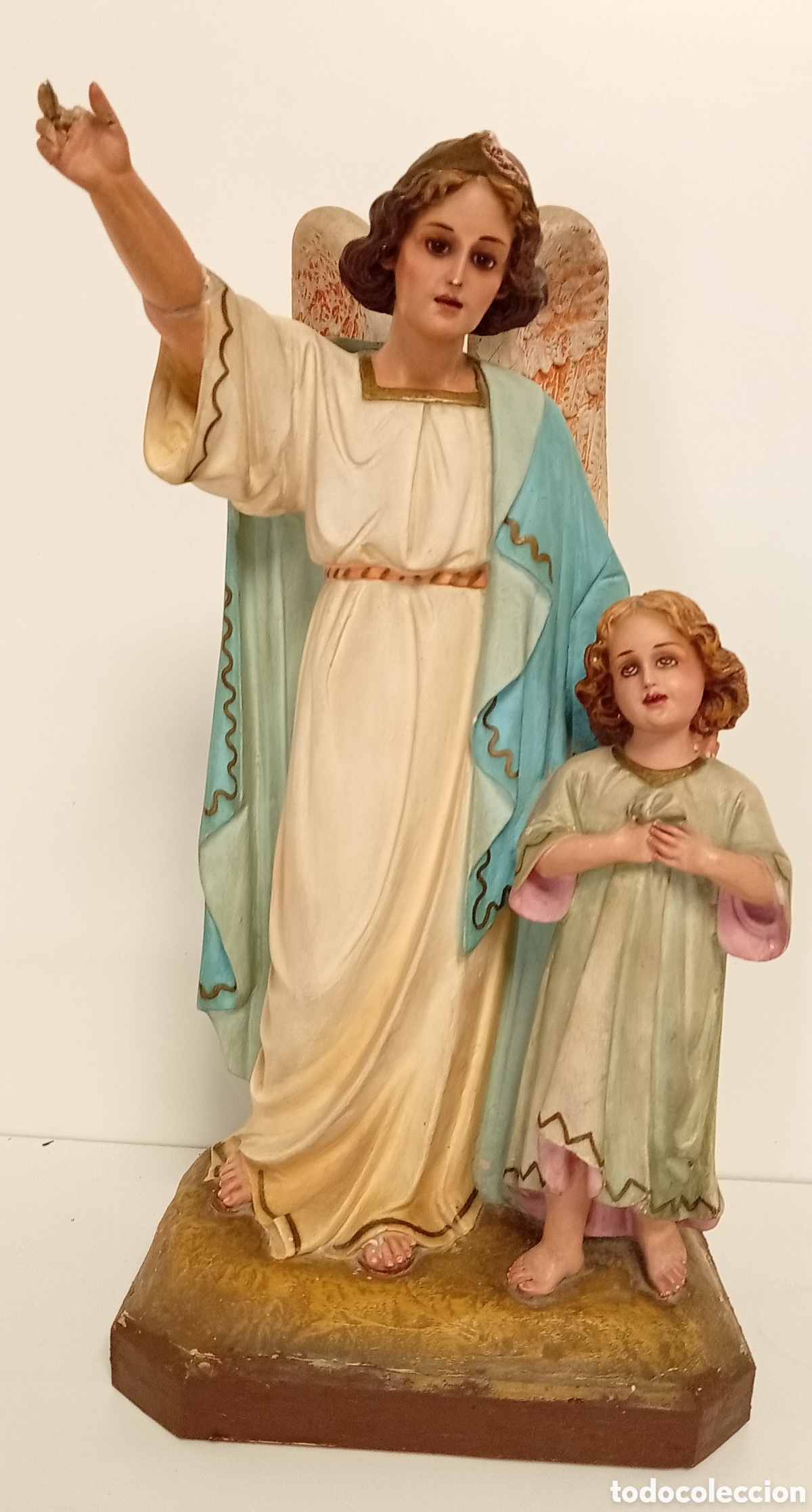 Antig&uuml;edades: FIGURA DE ANGEL DE LA GUARDA CUIDADDO UN NI&Ntilde;O OLOT