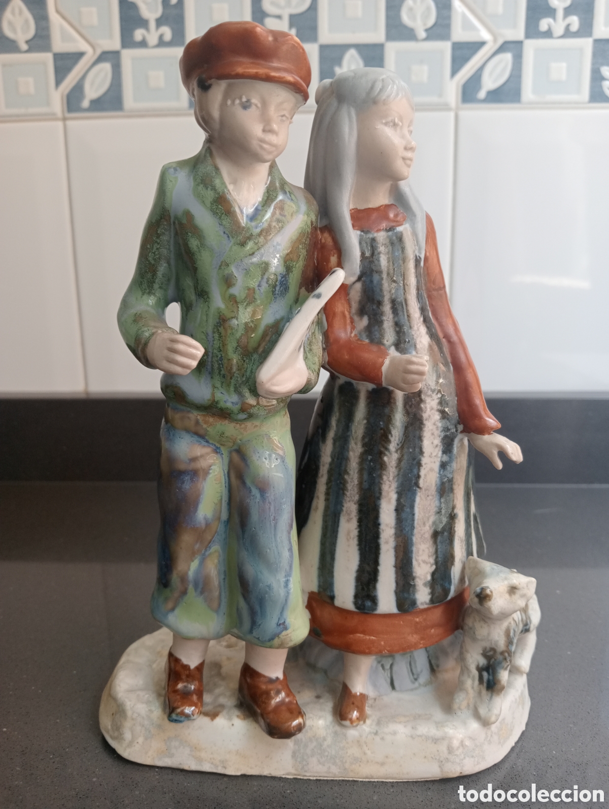 Antig&uuml;edades: Figura de Ram&oacute;n Ingl&eacute;s y querub&iacute;n de Salvador Mayol