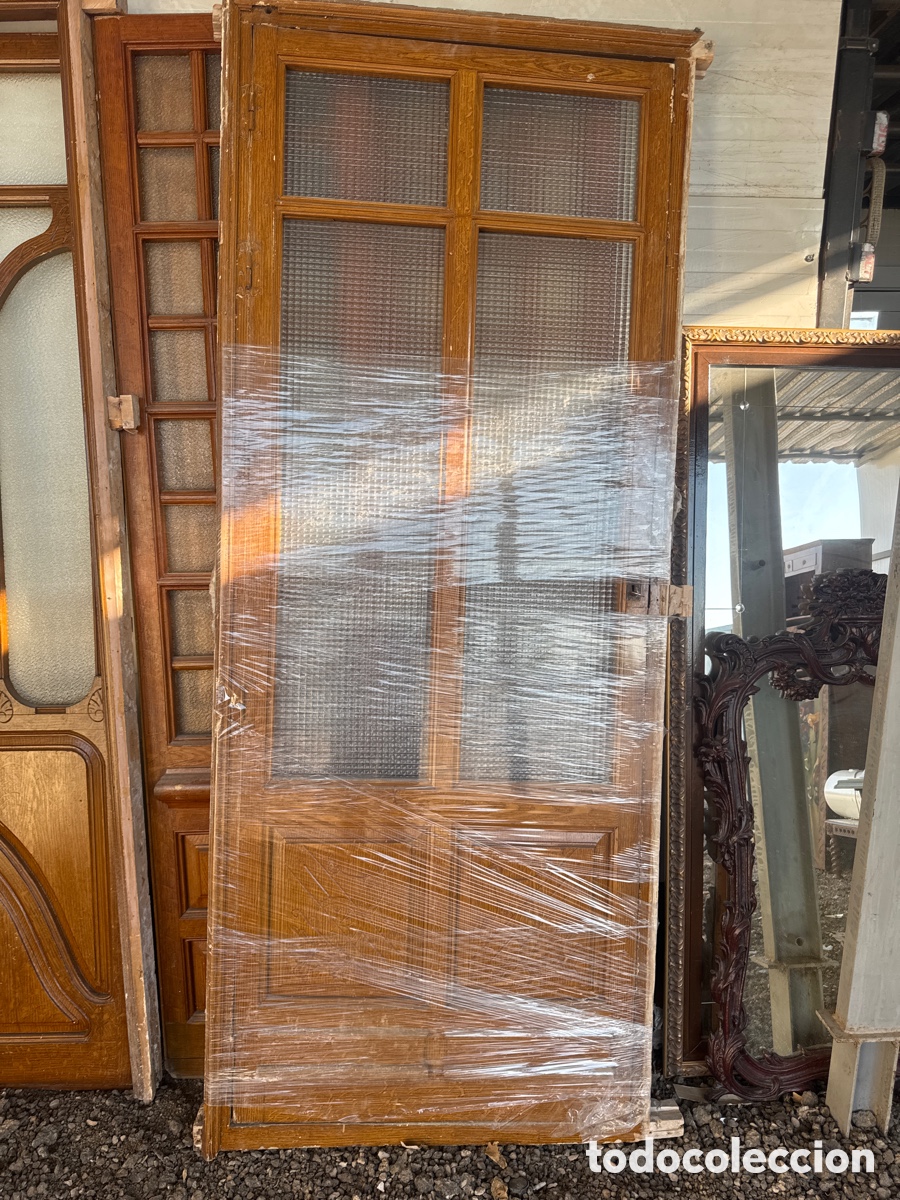 Oggetti Antichi: Puerta modernista de una hoja con Monito talla dos en la parte de abajo