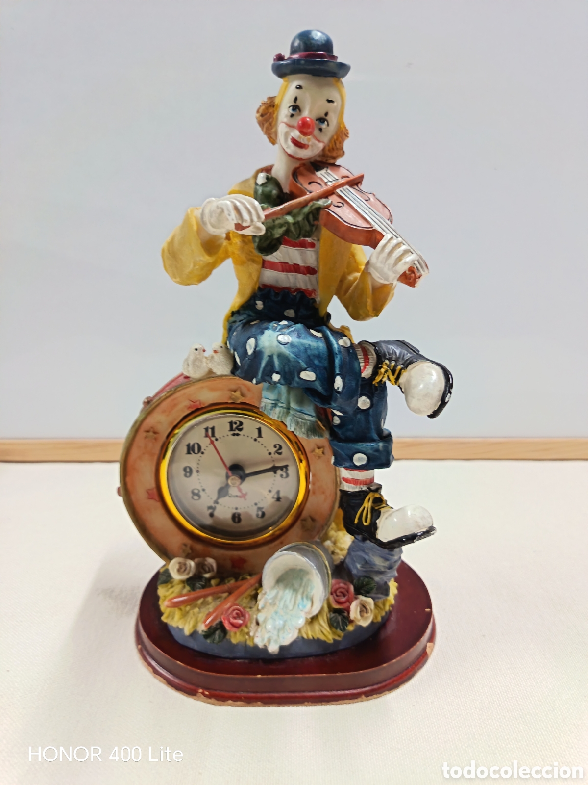 Antig&uuml;edades: Reloj de mesa decorativo con figura de payaso