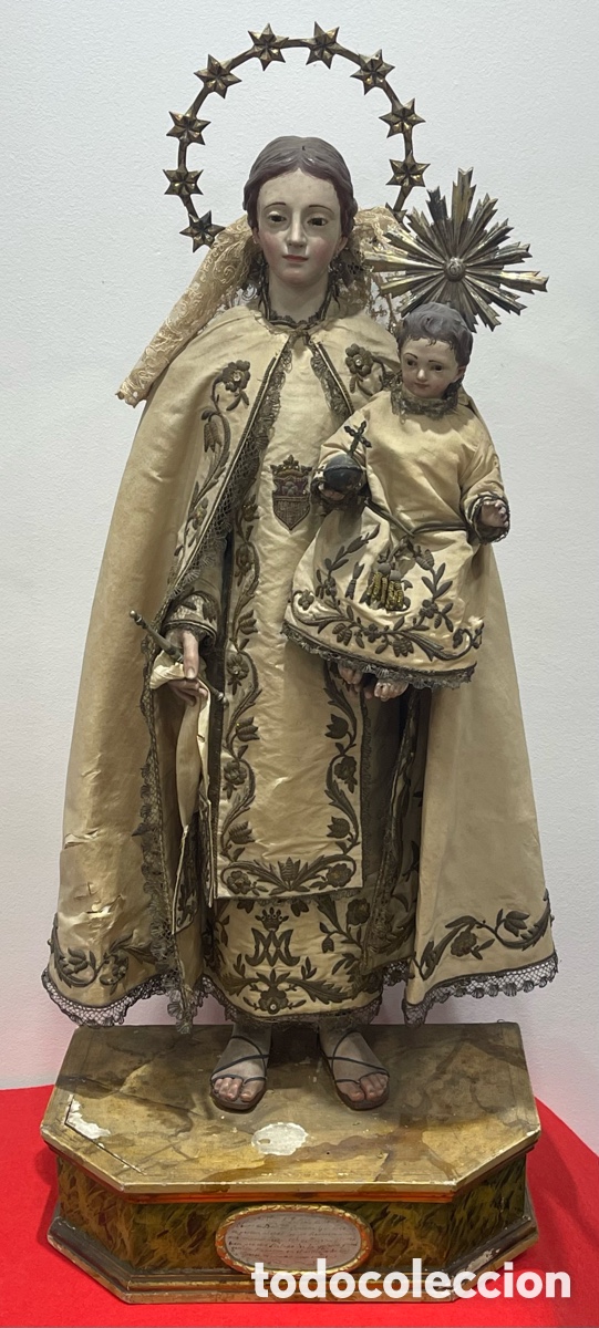 Antig&uuml;edades: Antigua Cap I Pota, de la virgen del Carmen con el ni&ntilde;o, con coronas de plata.