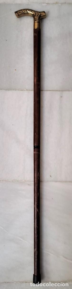 Antig&uuml;edades: BASTON DE MADERA CON EMPU&Ntilde;ADERA CURVA DE METAL. BASTON-07
