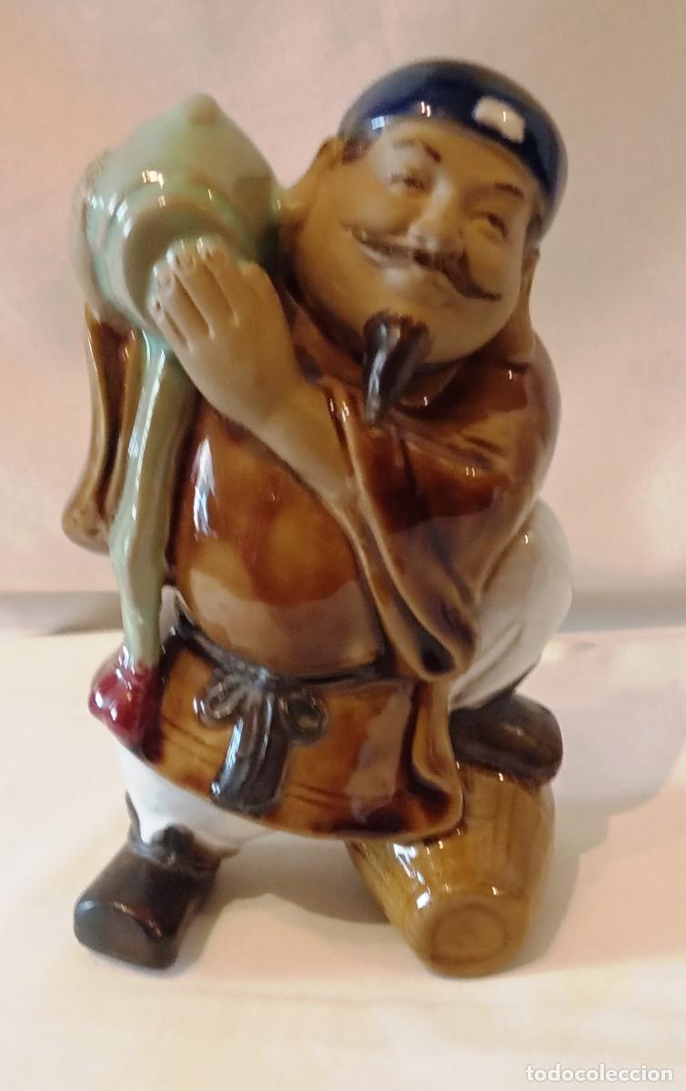Antig&uuml;edades: Figura porcelana Daikokuten