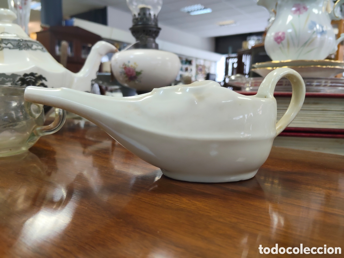 Antig&uuml;edades: Antiguo pistero de porcelana