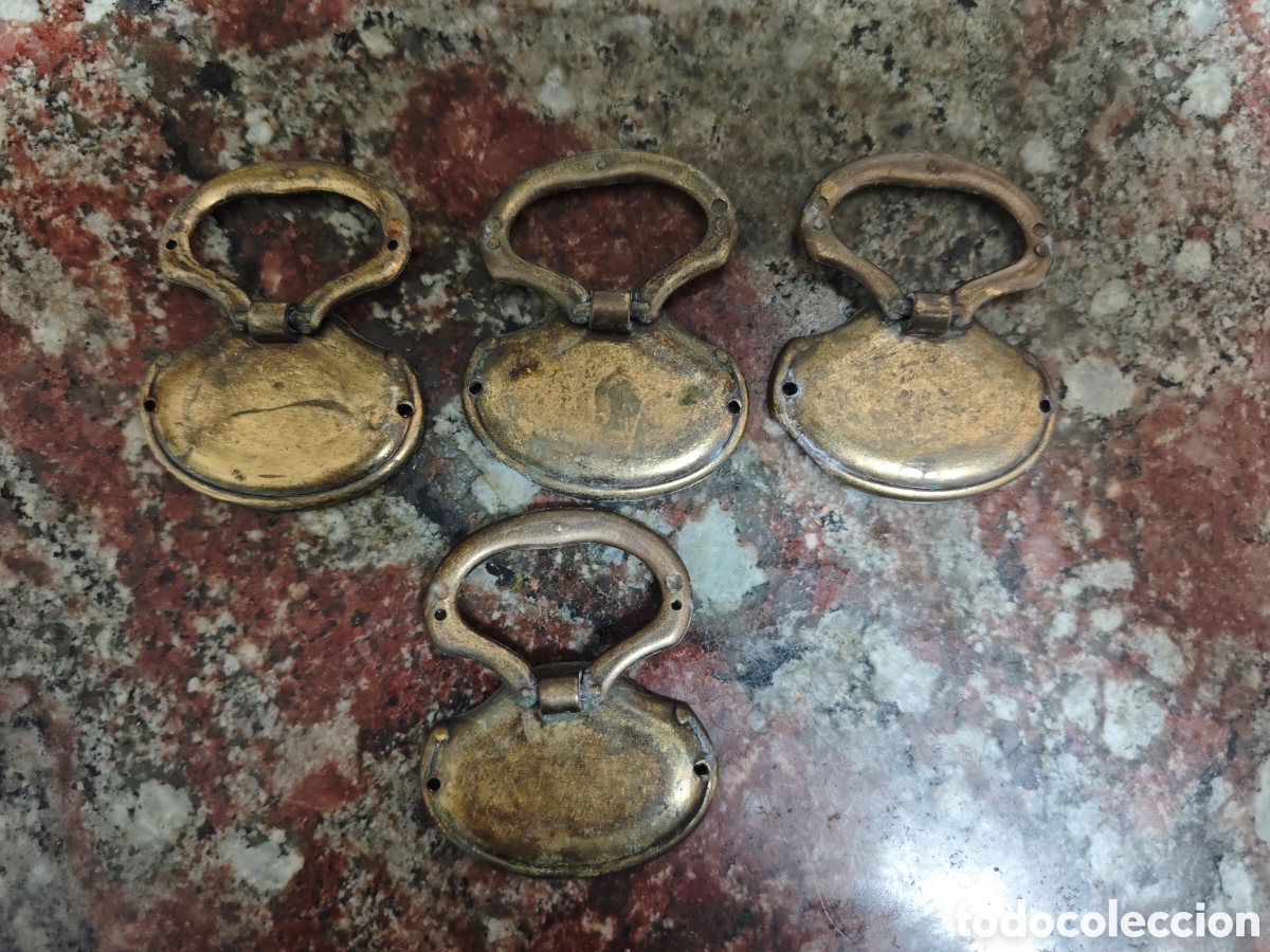 Antig&uuml;edades: Cuatro tiradores antiguos en bronceo lat&oacute;n