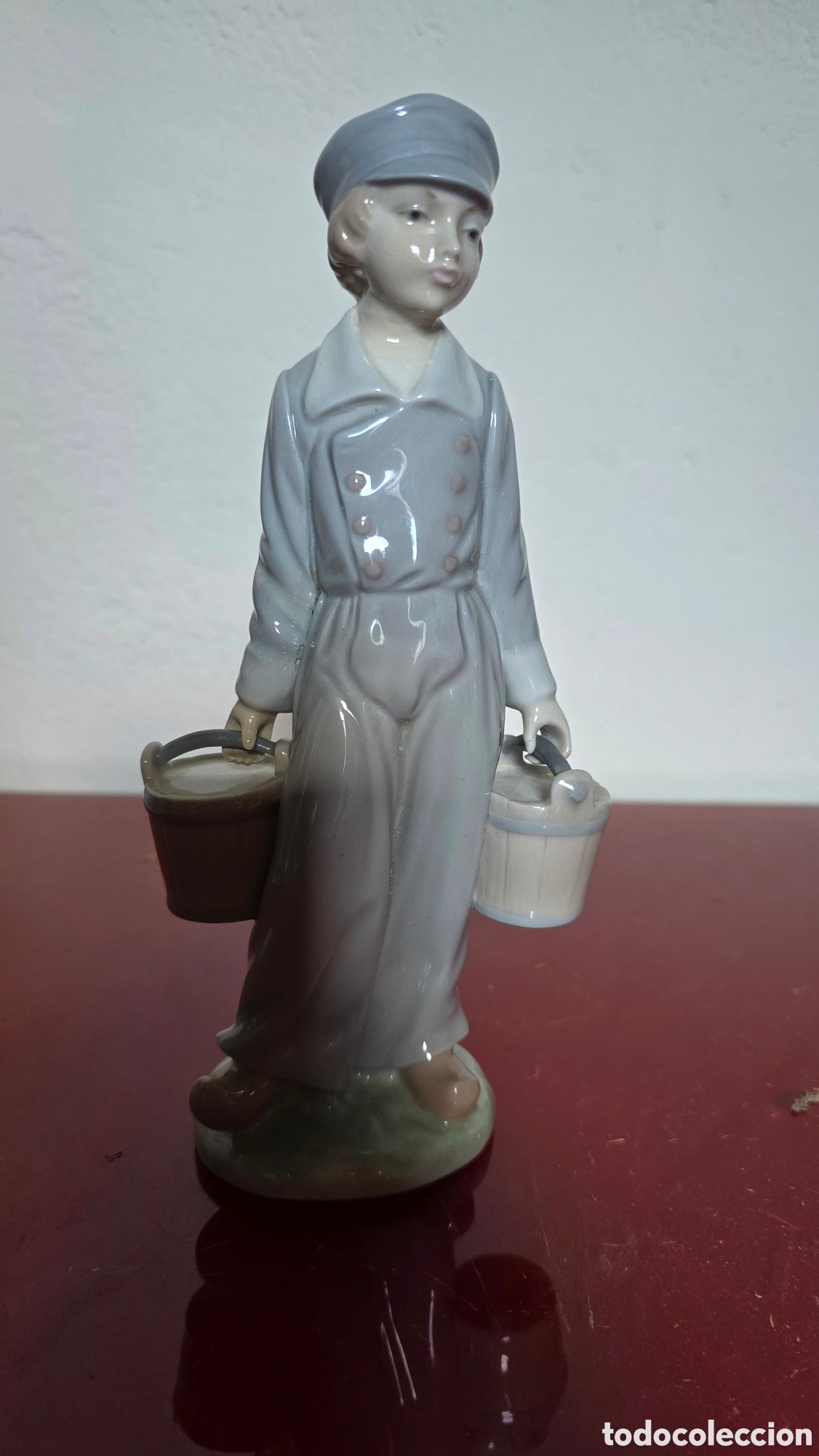 Antig&uuml;edades: Figura porcelana lladro ni&ntilde;o holandes