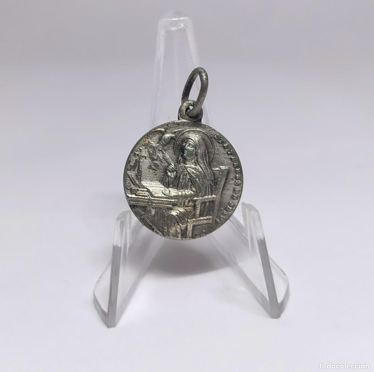 Antig&uuml;edades: Medalla religiosa / Colgante: SANTA TERESA DE JES&Uacute;S. M377