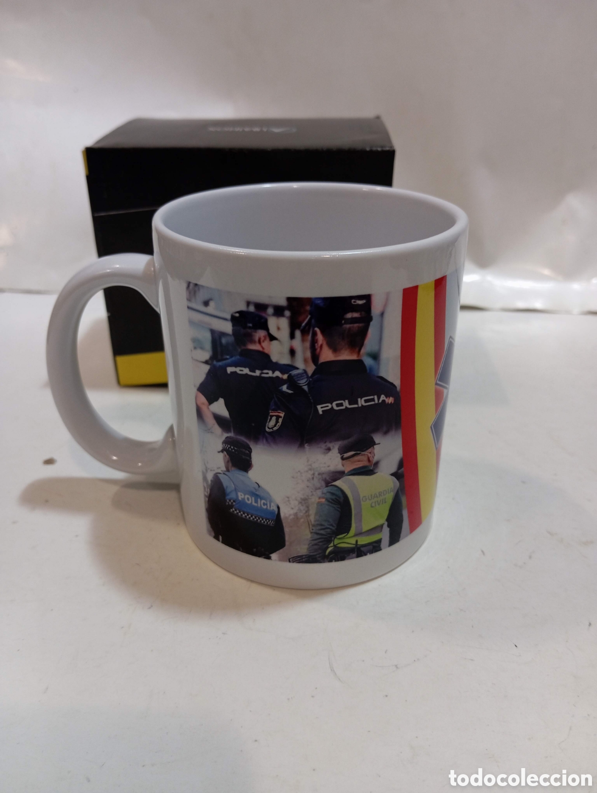 Antig&uuml;edades: Taza de ceramica cuerpos de seguridad policia