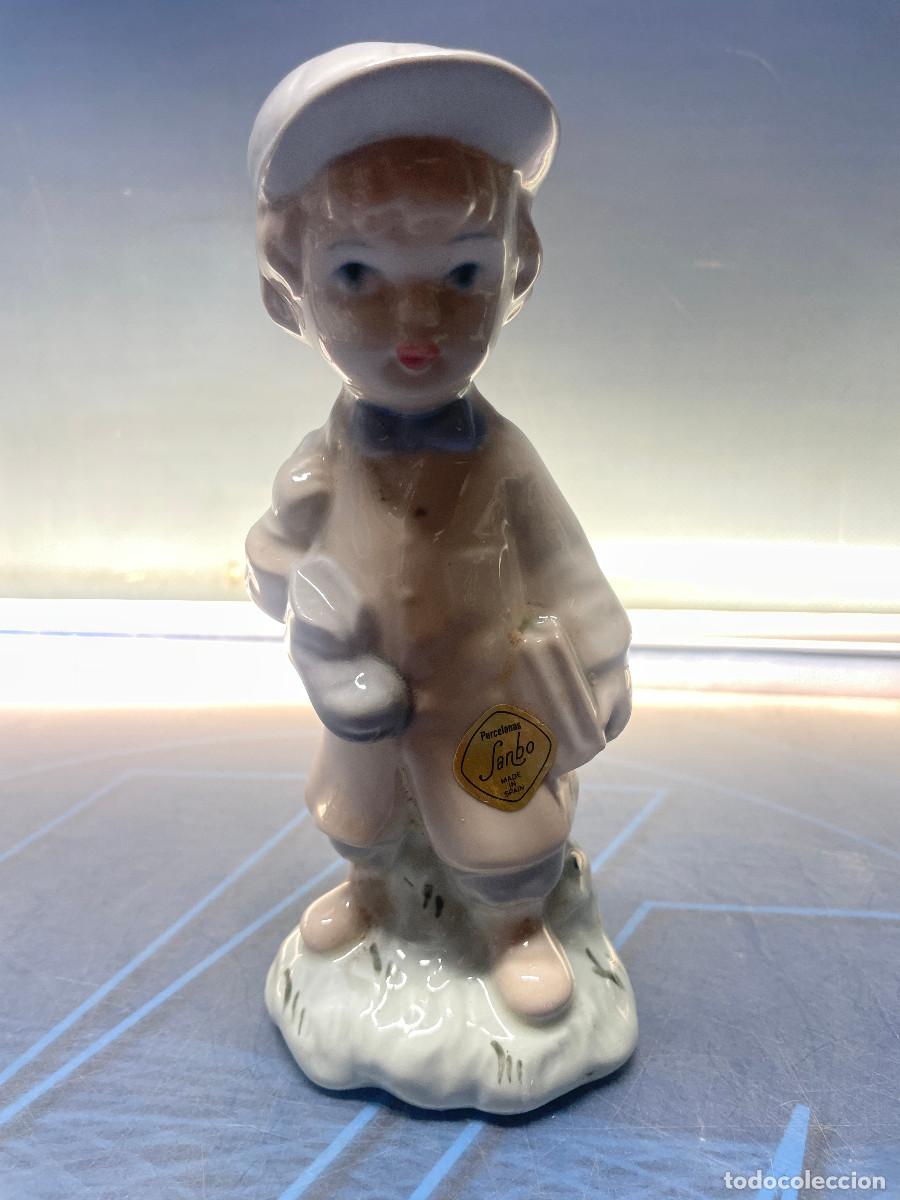 Antig&uuml;edades: Ni&ntilde;o con gorra porcelana sambo 19cm