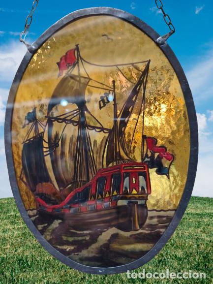 Antig&uuml;edades: Atrapasol de cristal ambar laminado con gale&oacute;n pintado a mano.