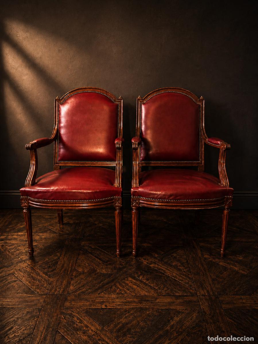 Antig&uuml;edades: Pareja de sillones de despacho estilo ingl&eacute;s en cuero oxblood y madera maciza con muelles helicoidal
