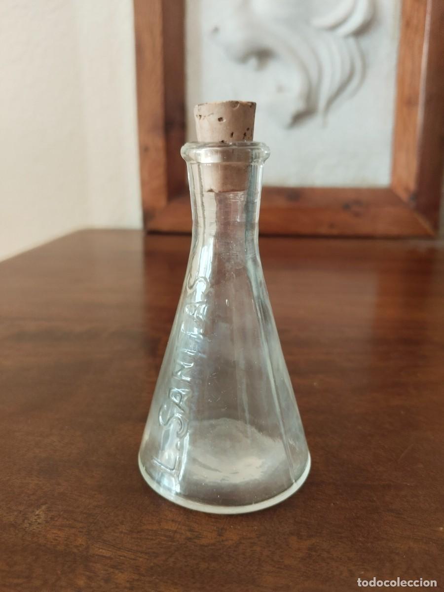 Antig&uuml;edades: Botellita en forma de Matraz de L. Sanitas. Lisboa, Portugal. Farmacia.