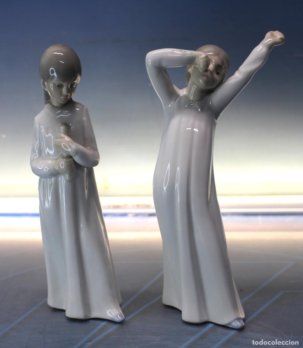 Antig&uuml;edades: Porcelana Lladr&oacute;. Ni&ntilde;a con vela + Ni&ntilde;o Despertando.