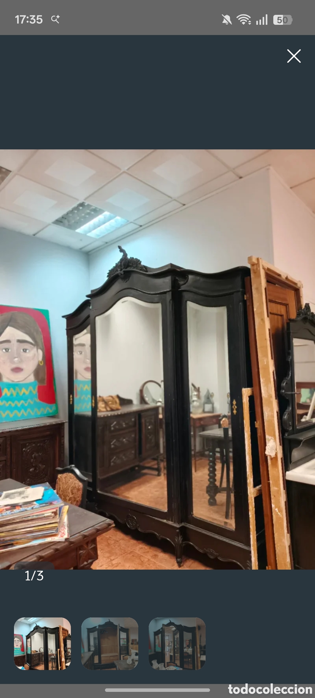 Antig&uuml;edades: Armario antiguo de madera tallada con espejos