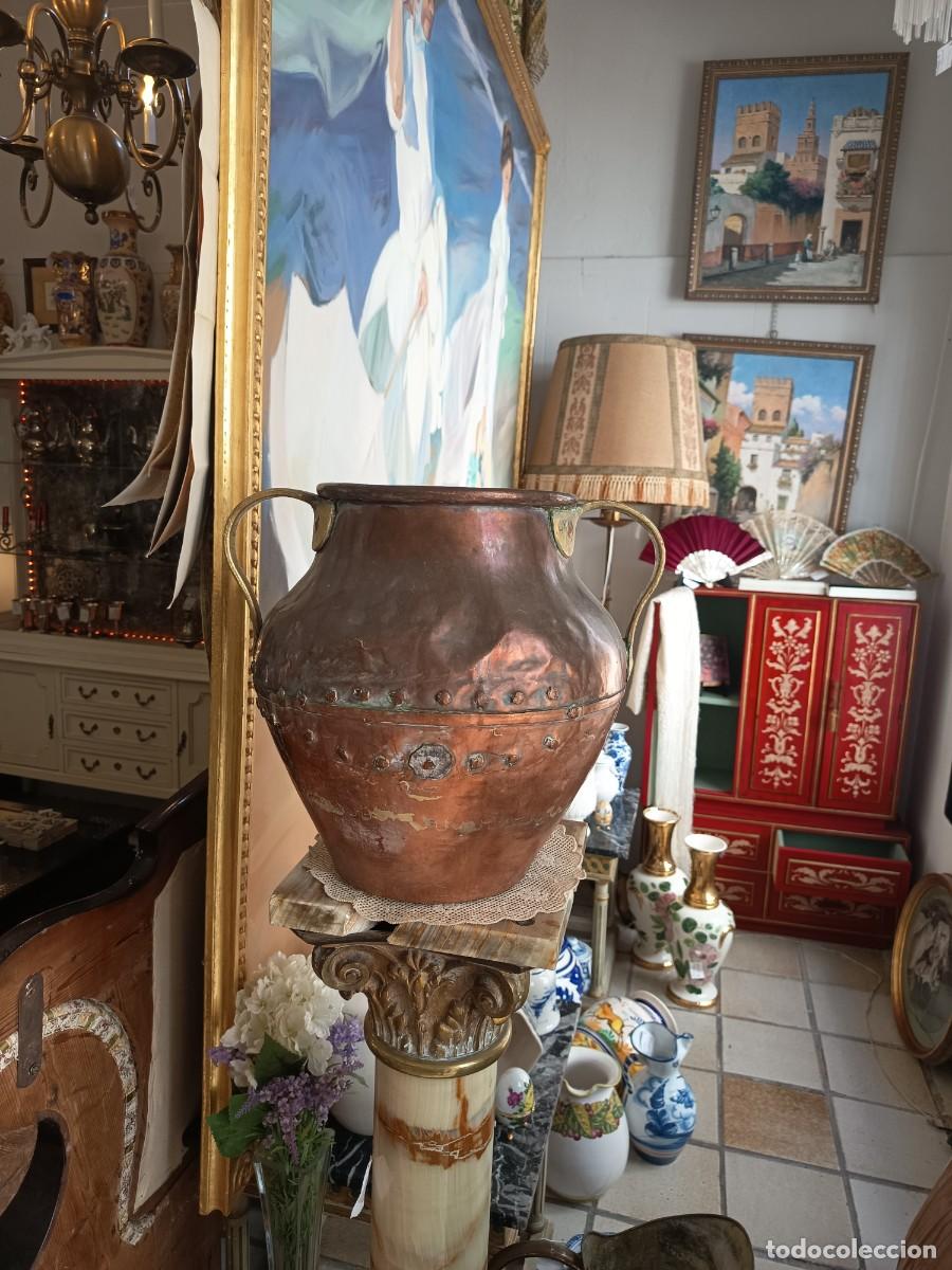 Antig&uuml;edades: C&aacute;ntaro antiguo de cobre