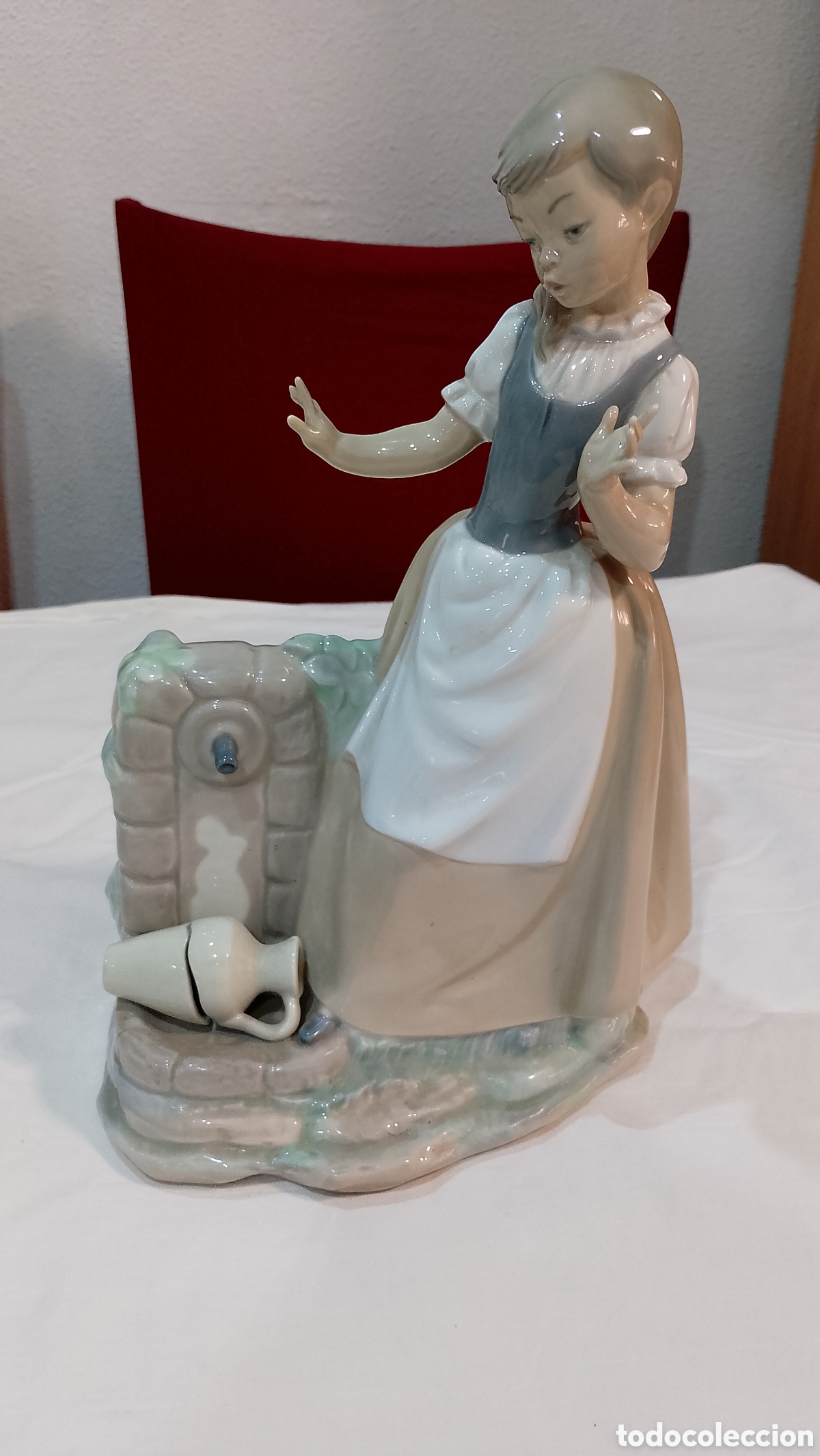 Antig&uuml;edades: Bonita porcelana Nao de lladro ni&ntilde;a en la fuente