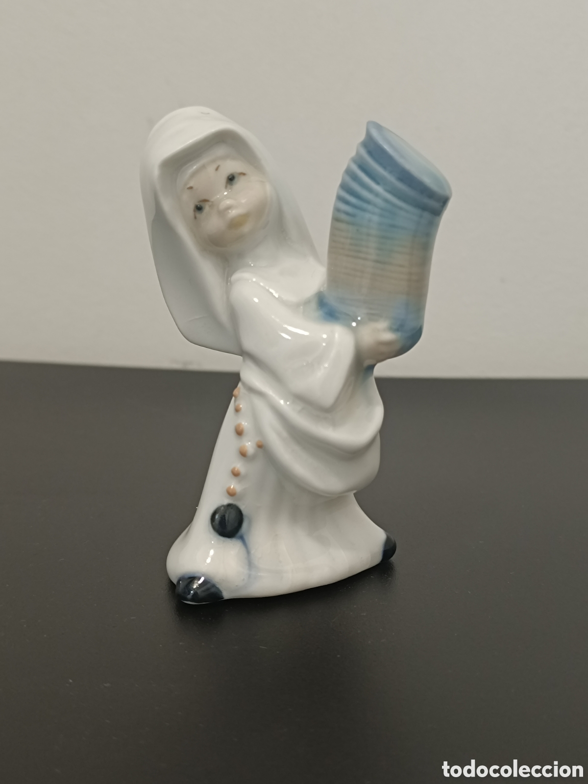 Antig&uuml;edades: Figura de porcelana Mirete