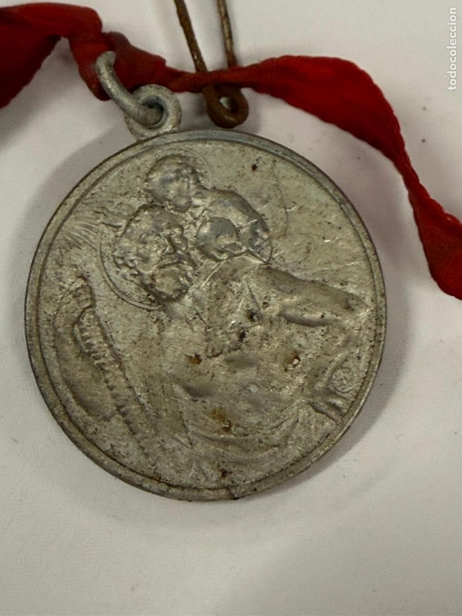 Antig&uuml;edades: Bonita medalla antigua de San Cristobal. En aluminio. 2,4cms