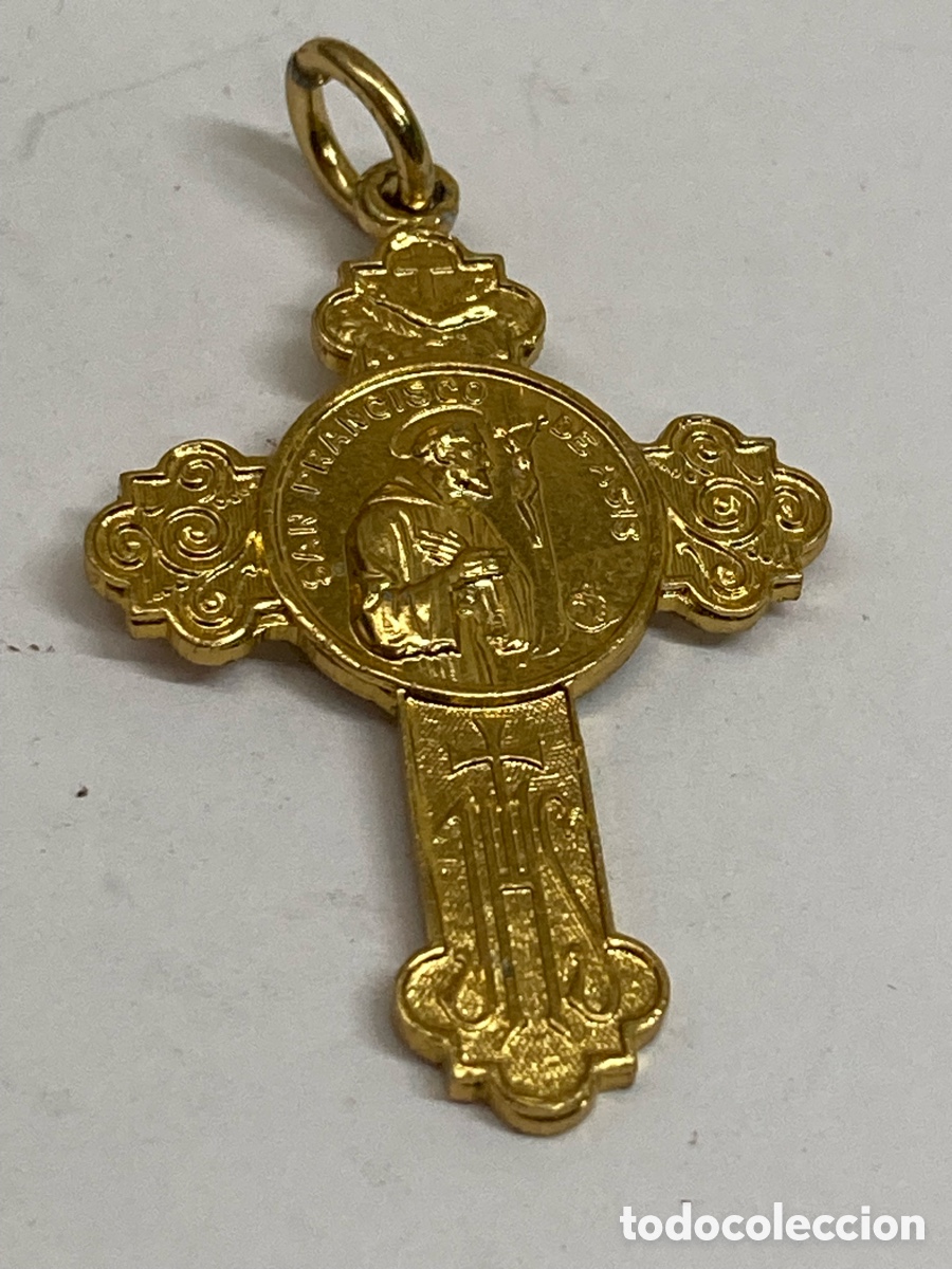 Antig&uuml;edades: Cruz de metal dorado religiosa