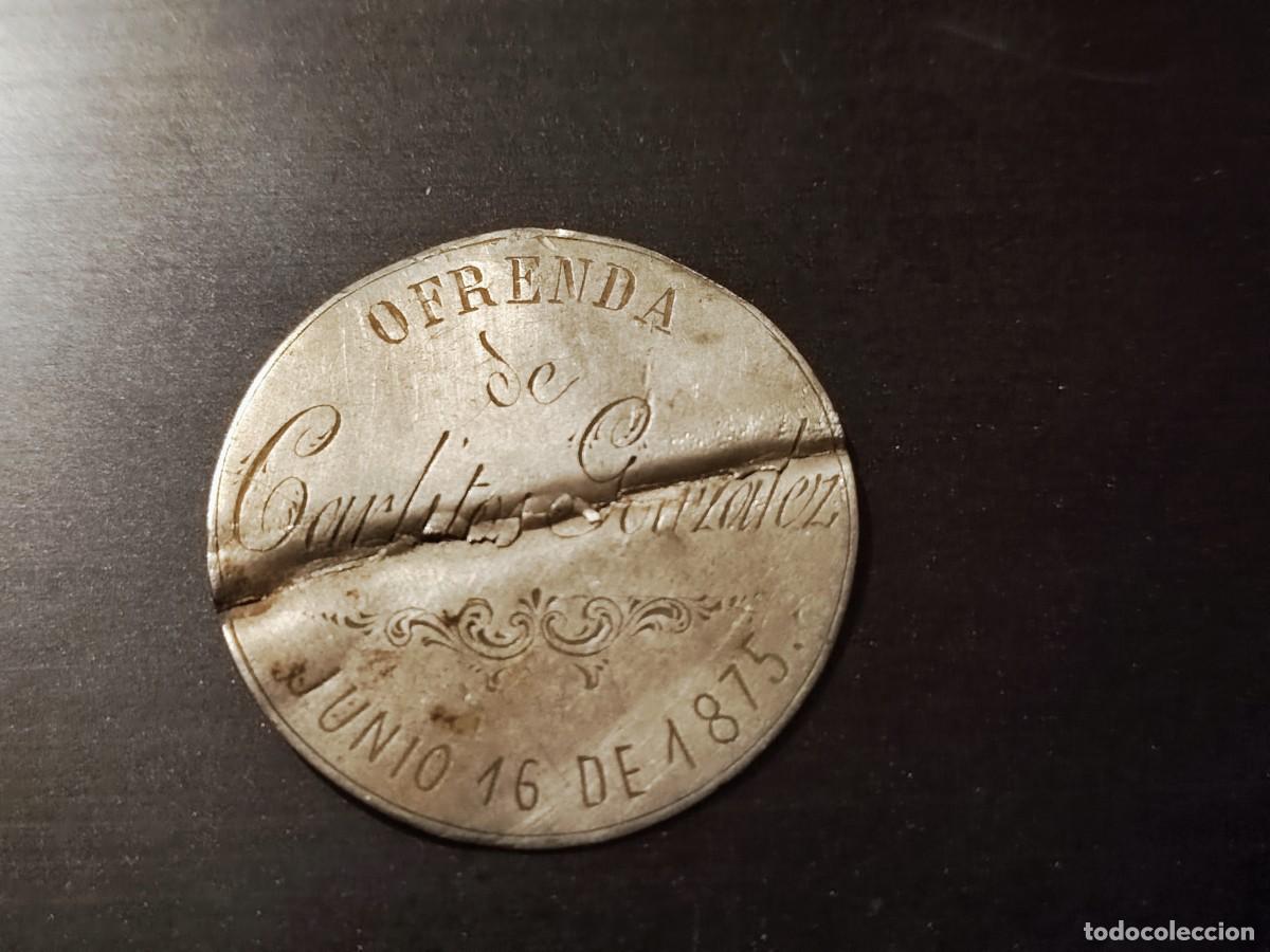 Antig&uuml;edades: Curiosa 0frenda de plata, de ni&ntilde;o,Junio de 1875.