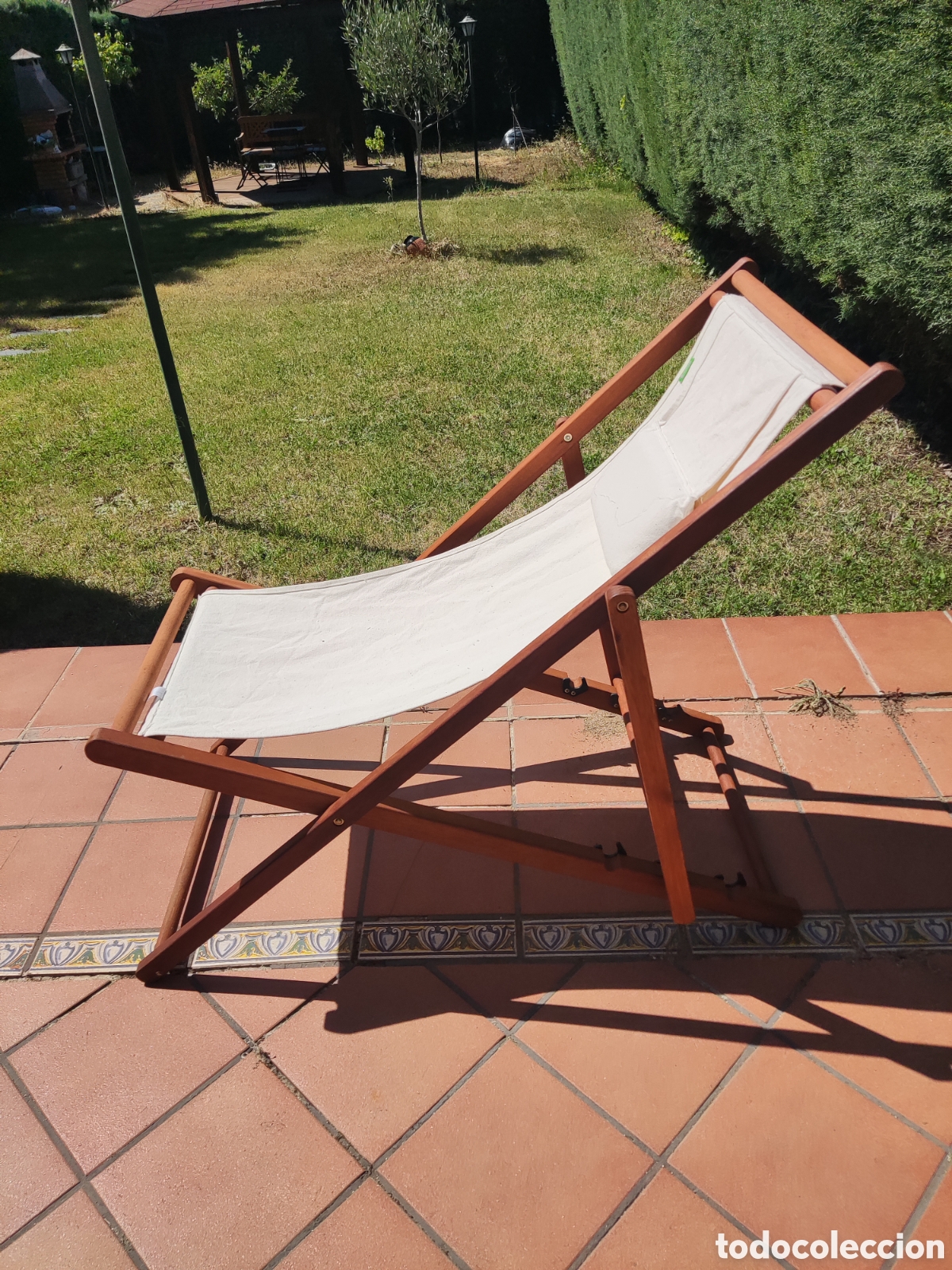 Antiquit&eacute;s: Tumbona plegable madera y lona Tumbona plegable de madera con asiento y respaldo de lona color crudo