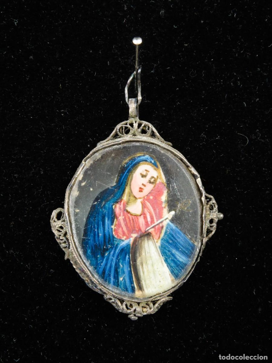 Antig&uuml;edades: Relicario en plata anverso imagen Santa Faz reverso imagen de la Dolorosa siglo XVIII