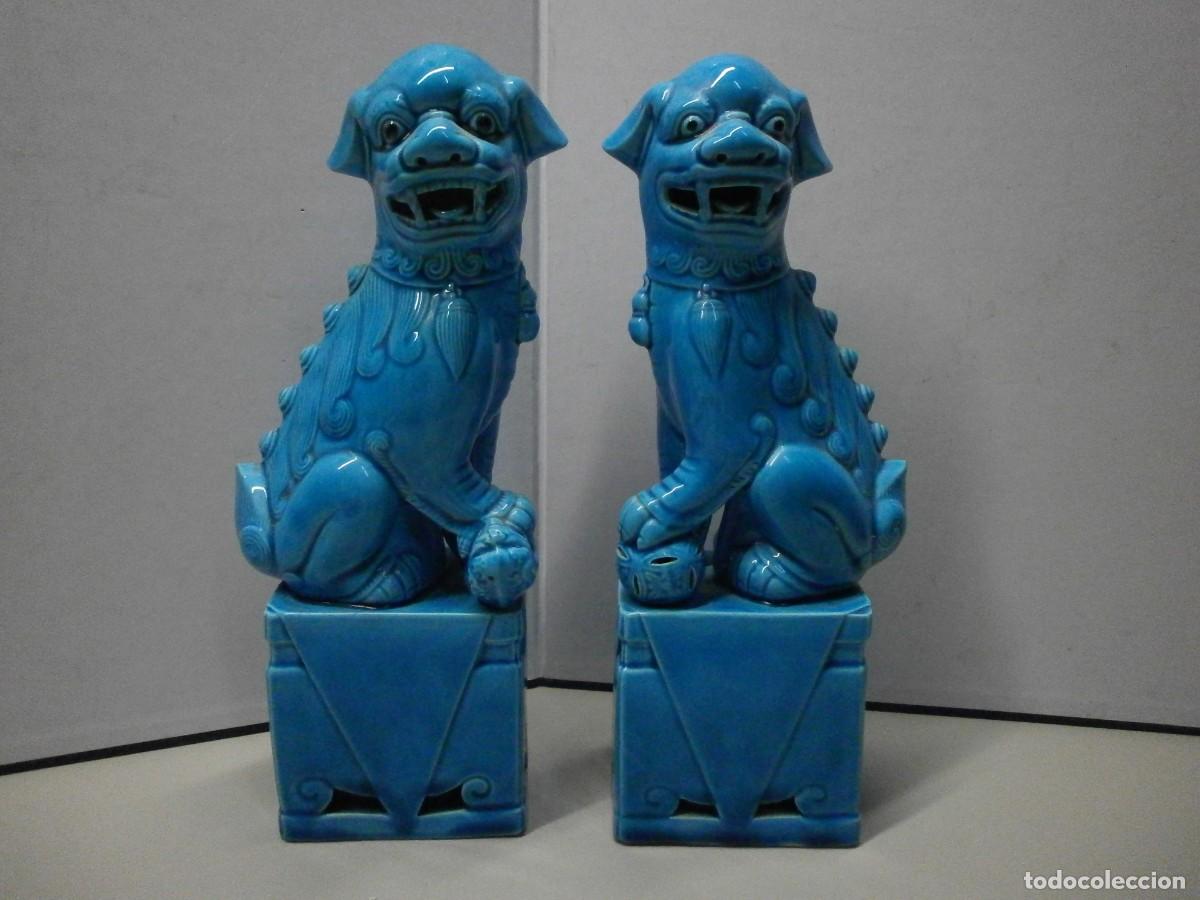 Antig&uuml;edades: pareja de perros foo porcelana china en color turquesa buen estado 25 cms