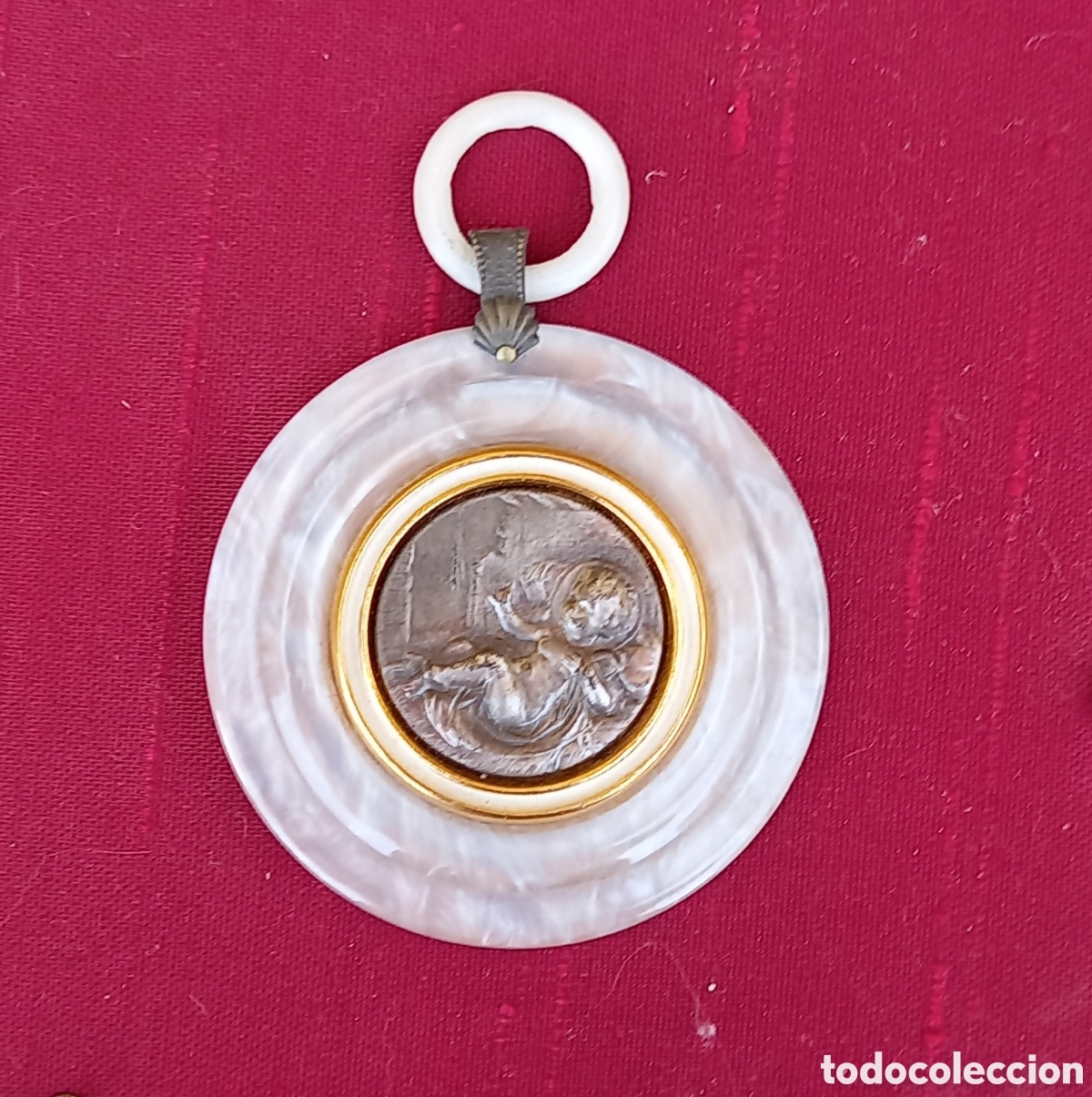 Antig&uuml;edades: ANTIGUO ADORNO O MEDALLA RELIGIOSA