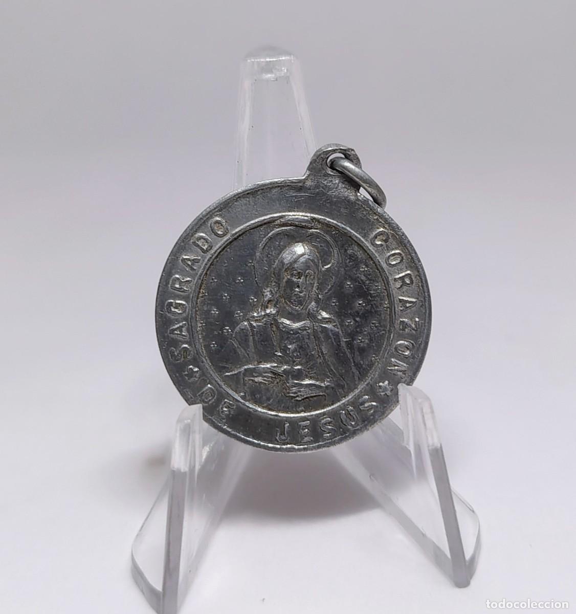Antig&uuml;edades: Medalla religiosa / Colgante: SAGRADO CORAZ&Oacute;N DE JES&Uacute;S y N. S. DEL CARMEN. M404
