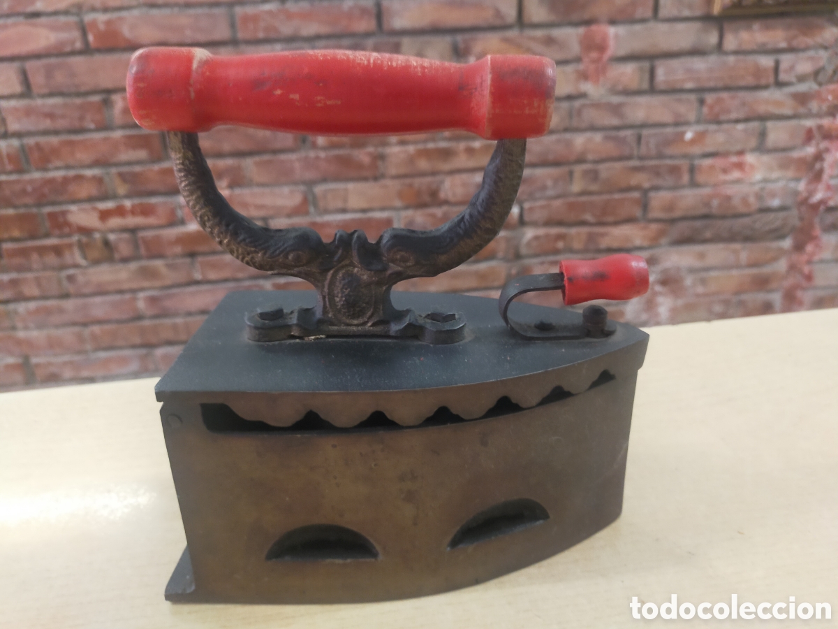Antig&uuml;edades: Antigua plancha de carb&oacute;n