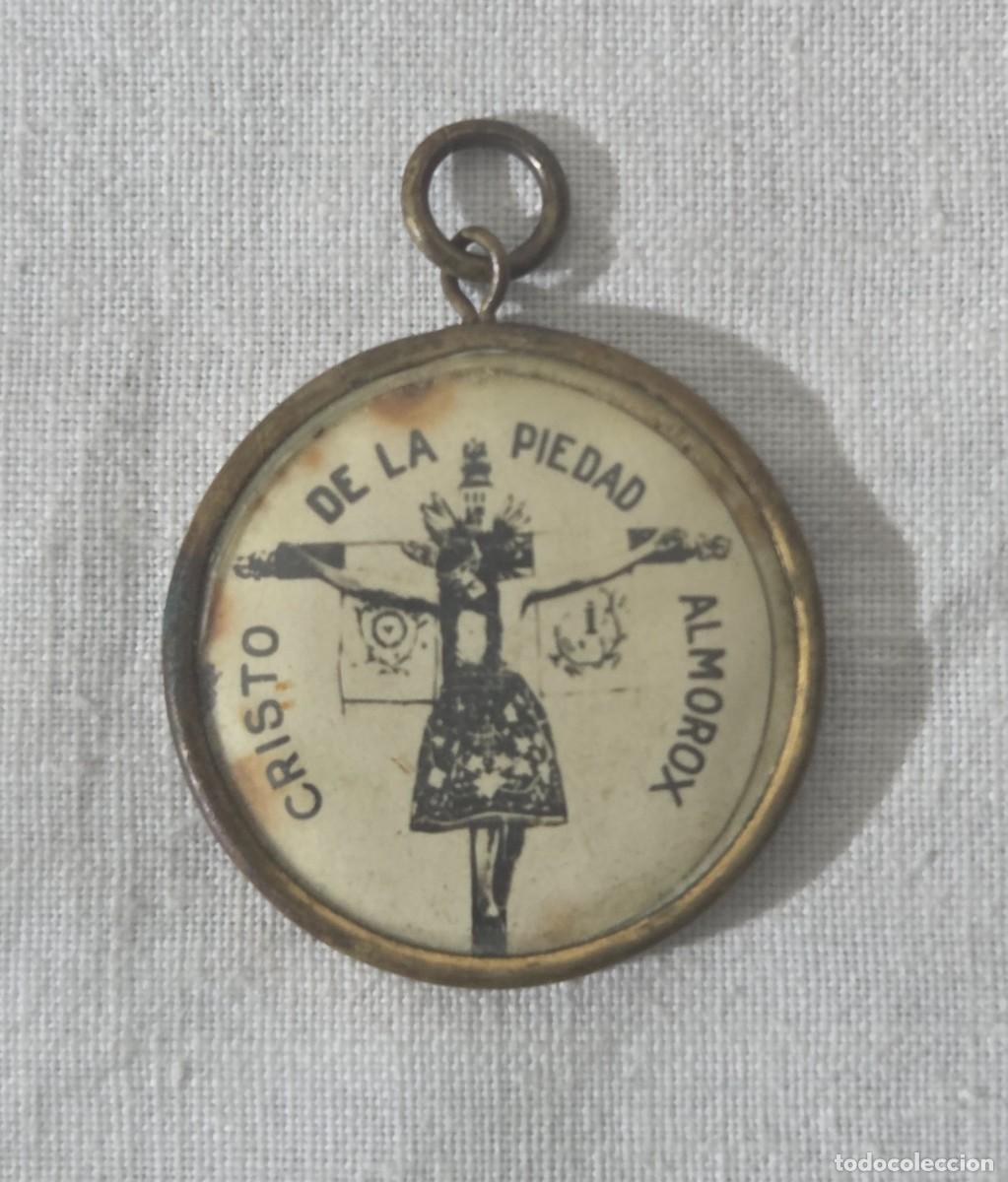 Antig&uuml;edades: Medalla Cristo de la piedad, Almorox
