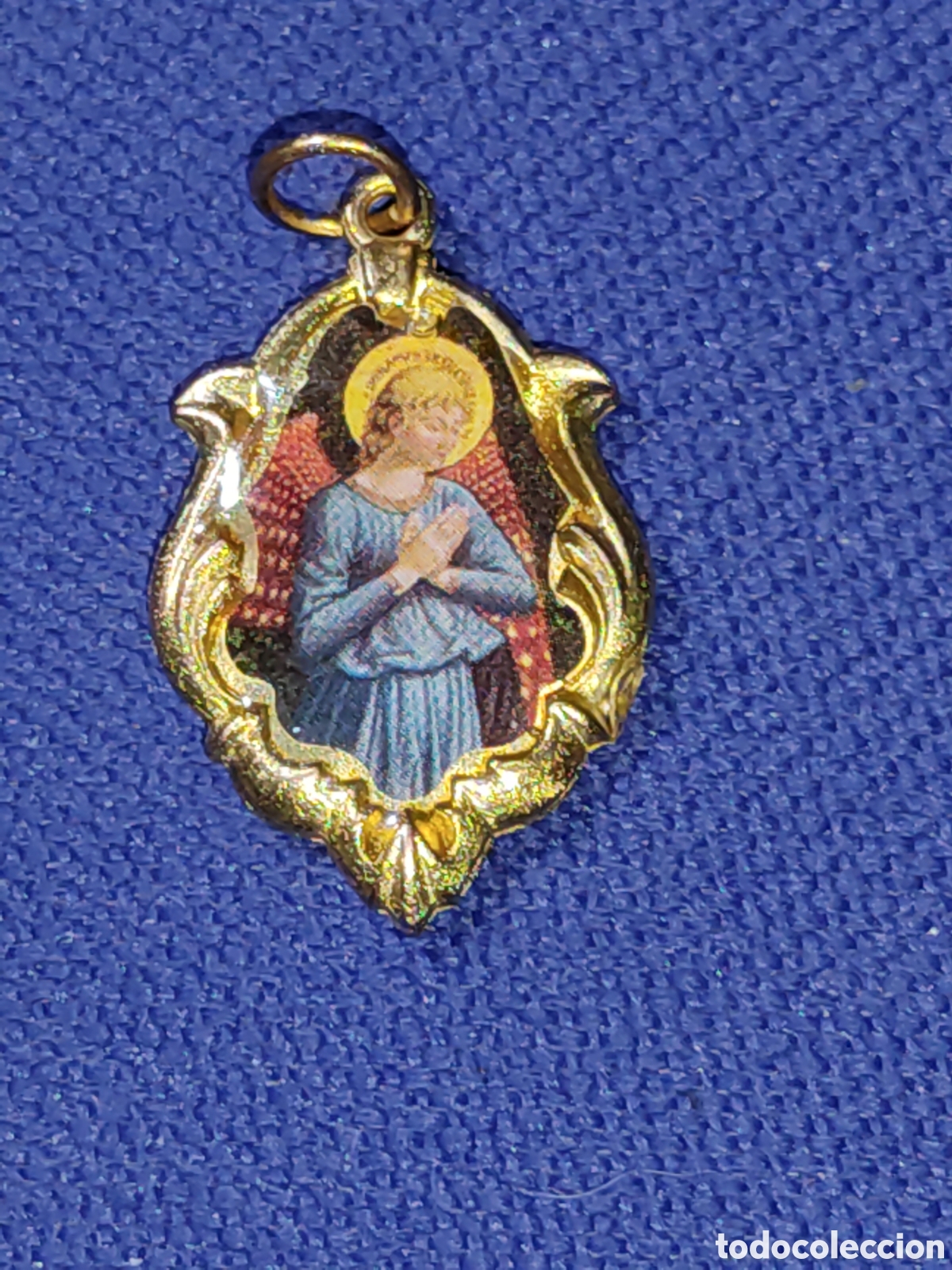 Antig&uuml;edades: Medalla esmalta del Arcangel San Miguel.