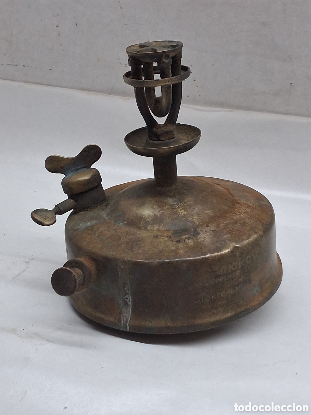 Antig&uuml;edades: hornillo, quemador, lat&oacute;n lux