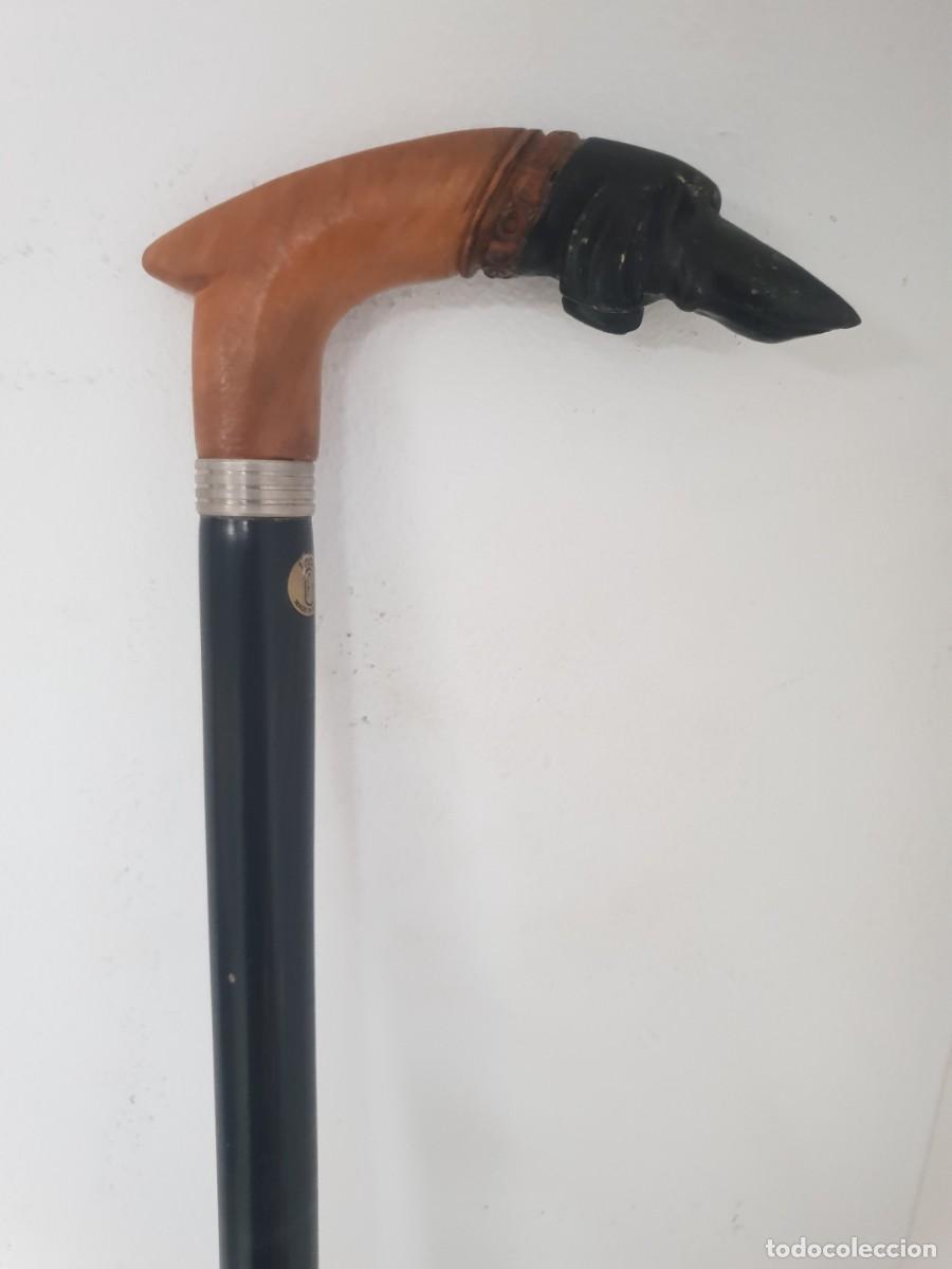 Antig&uuml;edades: Baston de madera de olivo cabeza de perro