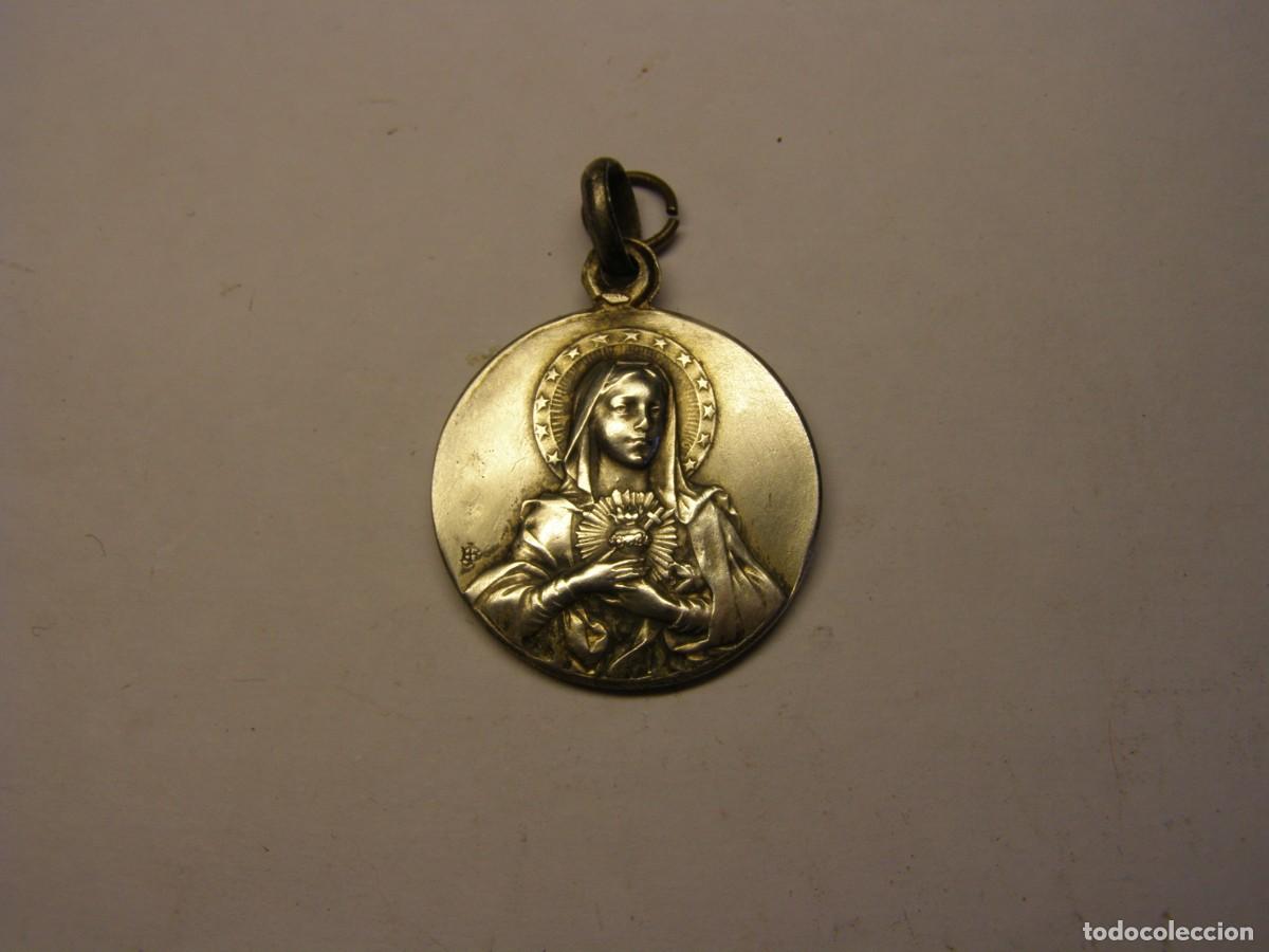 Antig&uuml;edades: Vieja medalla religiosa de los Sagrados Corazones de Jes&uacute;s y de Mar&iacute;a. De plata.