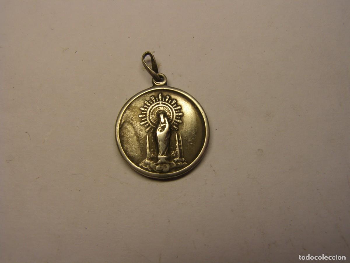 Antig&uuml;edades: Vieja medalla religiosa de N&ordf; S&ordf; del Pilar.