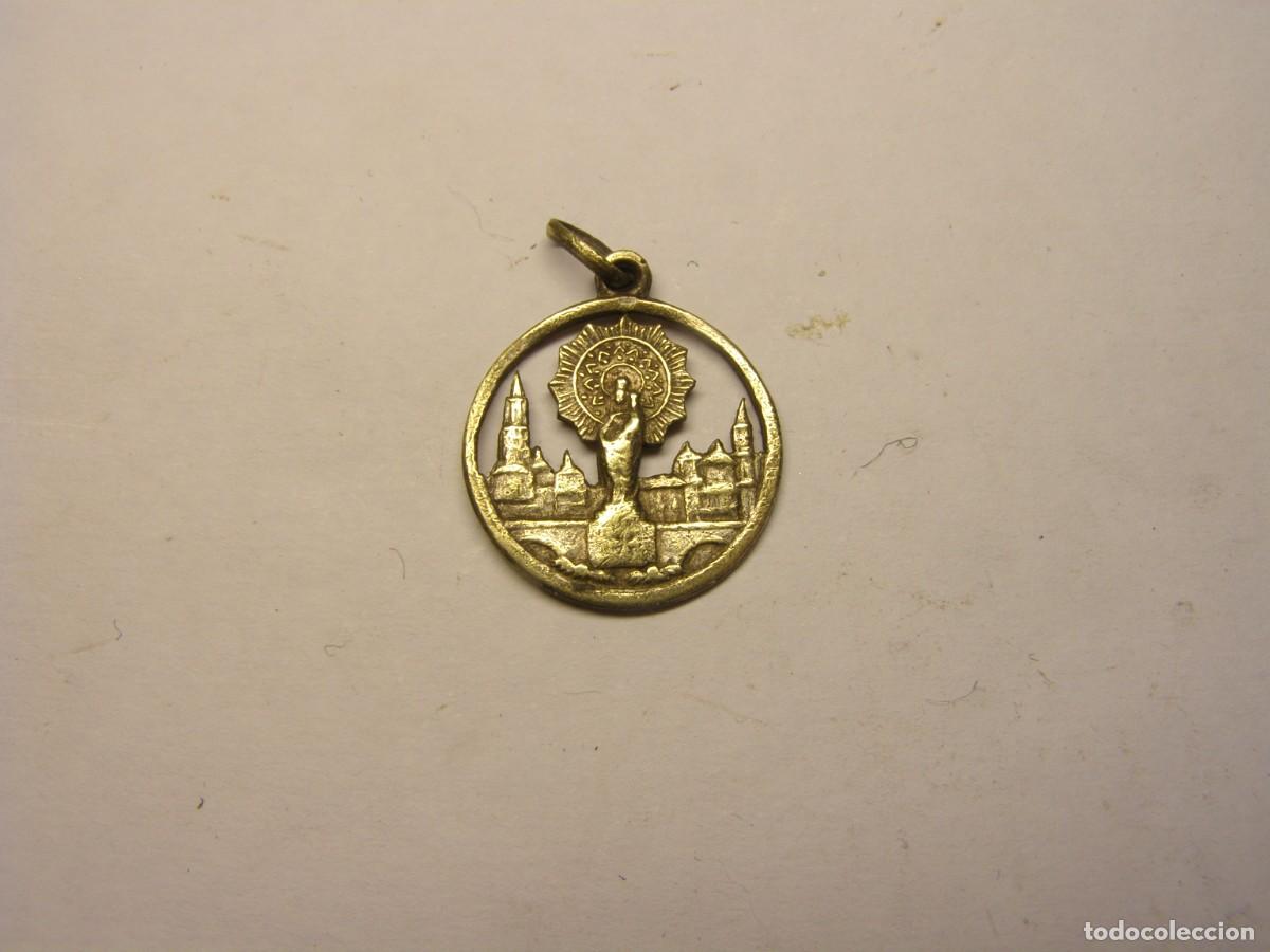 Antig&uuml;edades: Vieja medalla religiosa de N&ordf; S&ordf; del Pilar.