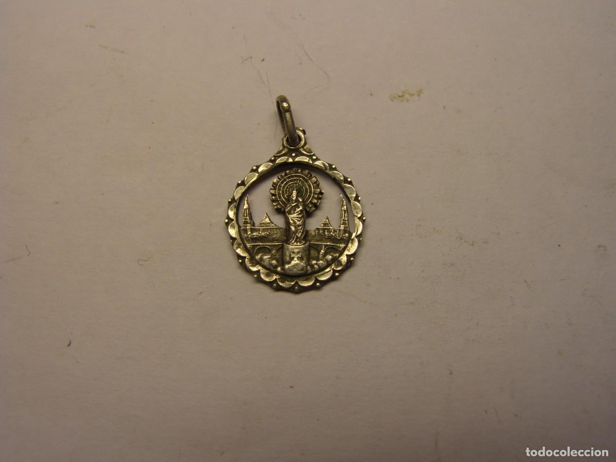 Antig&uuml;edades: Vieja medalla religiosa de N&ordf; S&ordf; del Pilar.