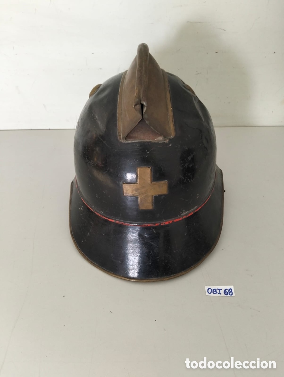 Antiquit&eacute;s: casco de bombero suizo vintage, de la d&eacute;cada de 1930.